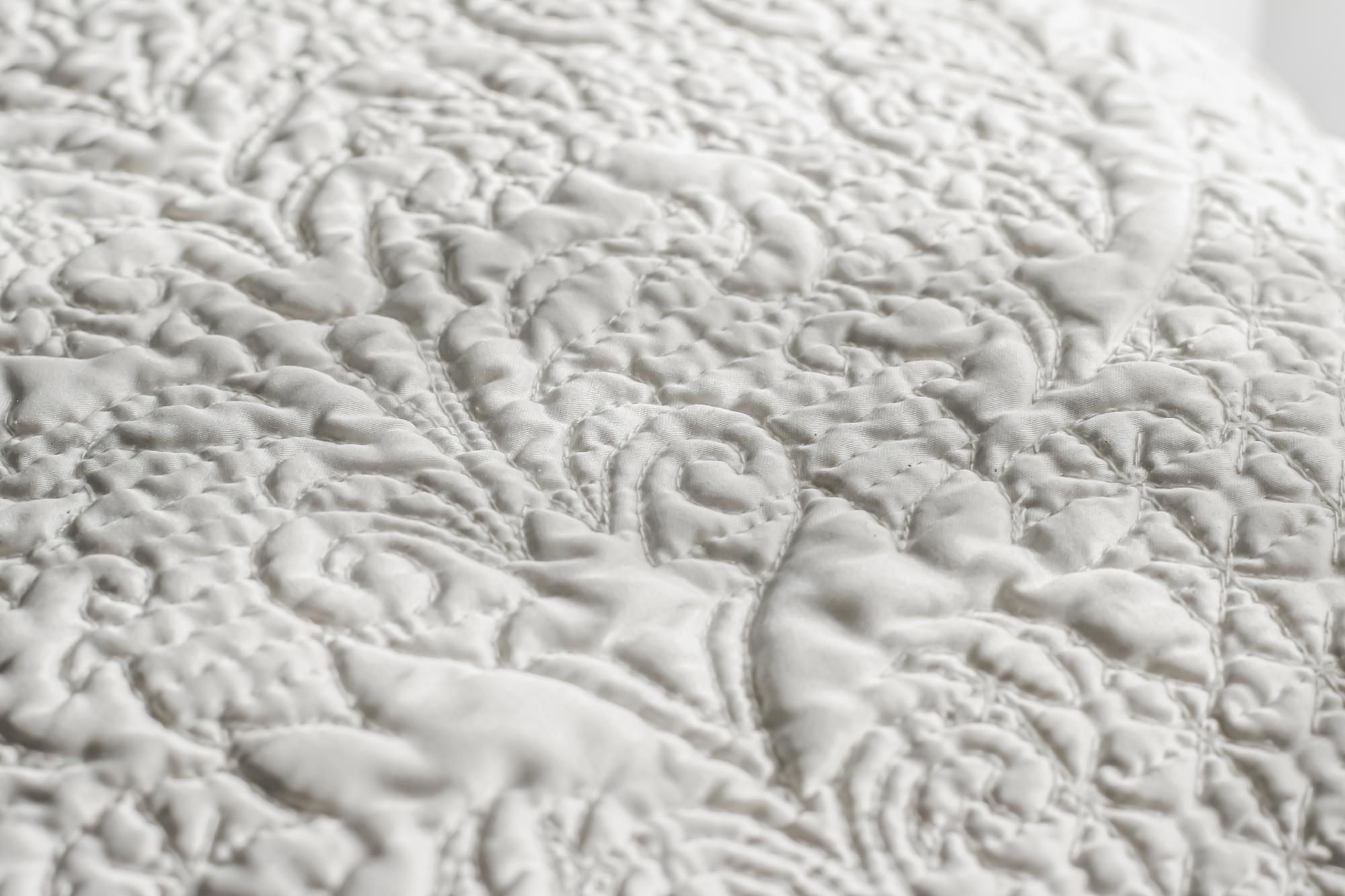 embroidered floral motif on linen